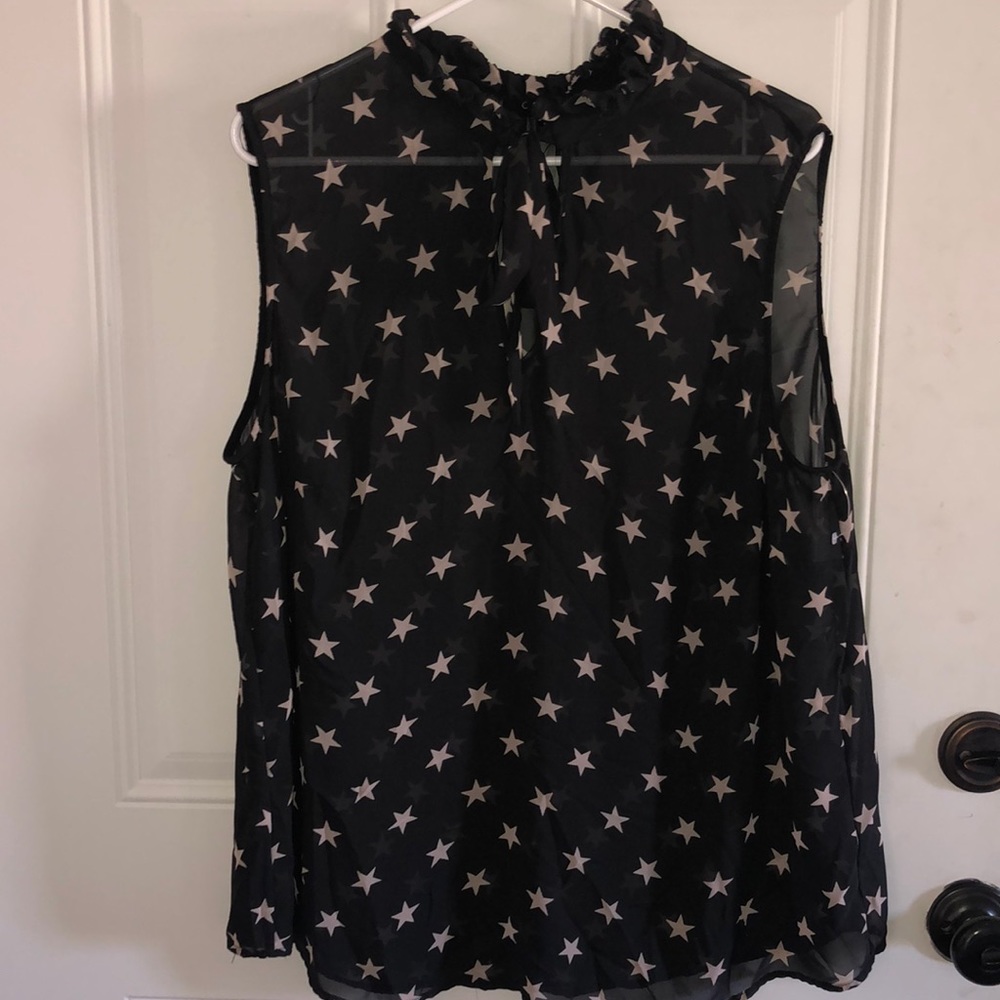 NWOT, sheer sleeveless. Tie at neck detail